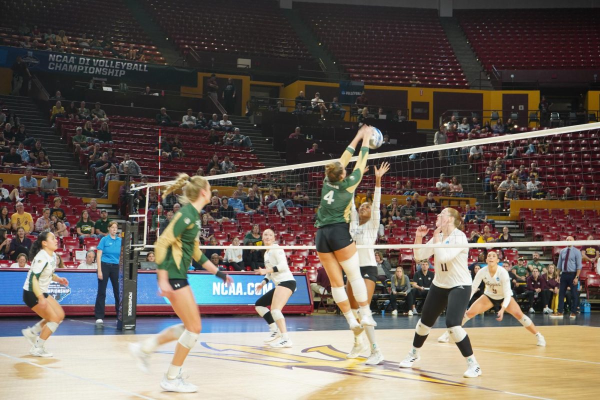 Emery Herman (4) dumping the ball in game against Texas A&M Dec 6. Colorado State volleyball lost 1-3 in first round of NCAA tournament.