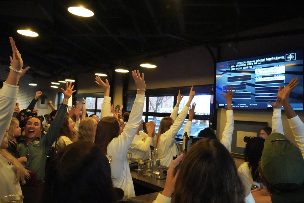 Colorado State volleyball cheers as its name is announced for the NCAA women's volleyball tournament . CSU will take on Texas A&M Dec. 6 in Tempe, AZ. 