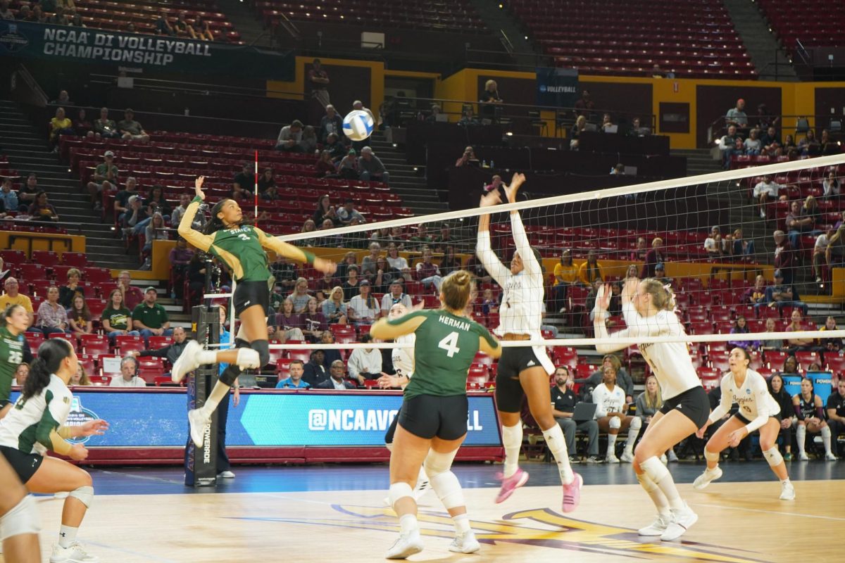 Naeemah Weathers (9) spiking the ball in game against Texas A&M Dec 6. Colorado State volleyball lost 1-3 in first round of NCAA tournament.