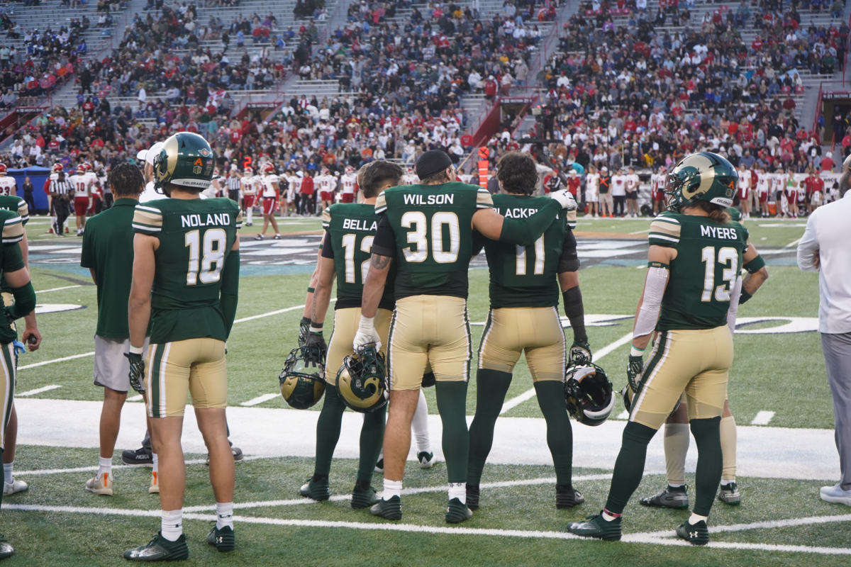 AJ Noland (18), Jace Bellah (12), Chase Wilson (30), Henry Blackburn (11), Dagan Myers (13) stand and watch the Snoop Dogg Arizona Bowl on Dec. 28 in Tucson, Arizona. Colorado State University football lost 43-17 to the University of Miami, Ohio. 