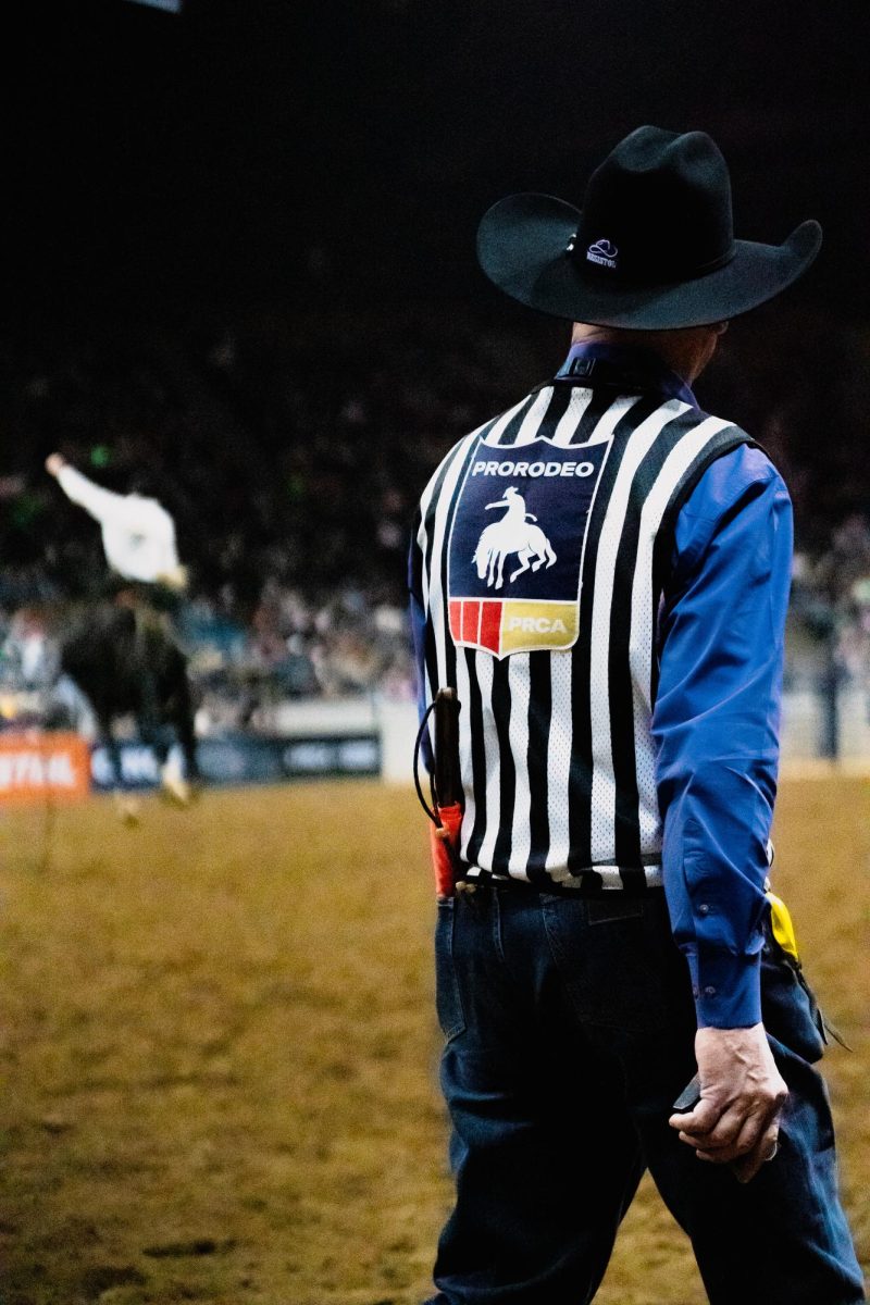 A rodeo referee watches an event