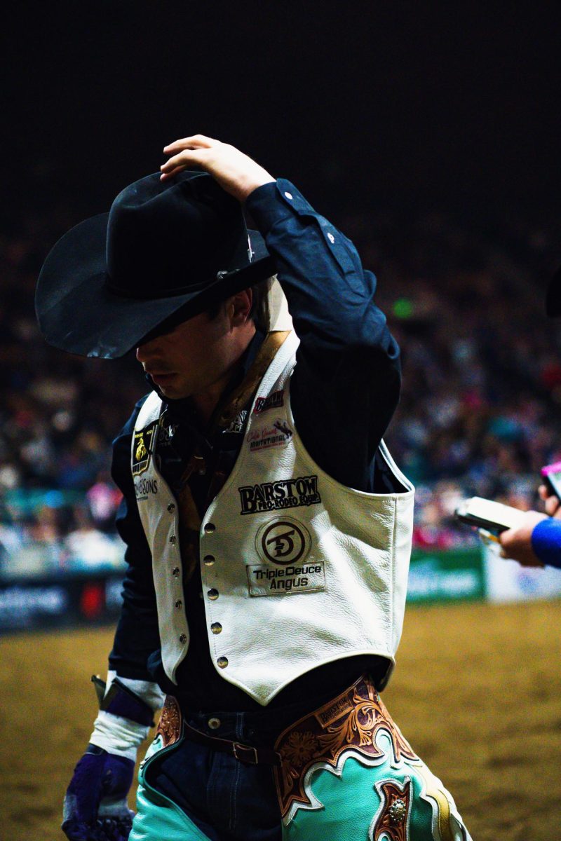 Bareback Rider Bradlee Miller walks off the arena following his round one ride during the bracket 4 National Western Stock Show Pro Rodeo Sunday, January 19. 