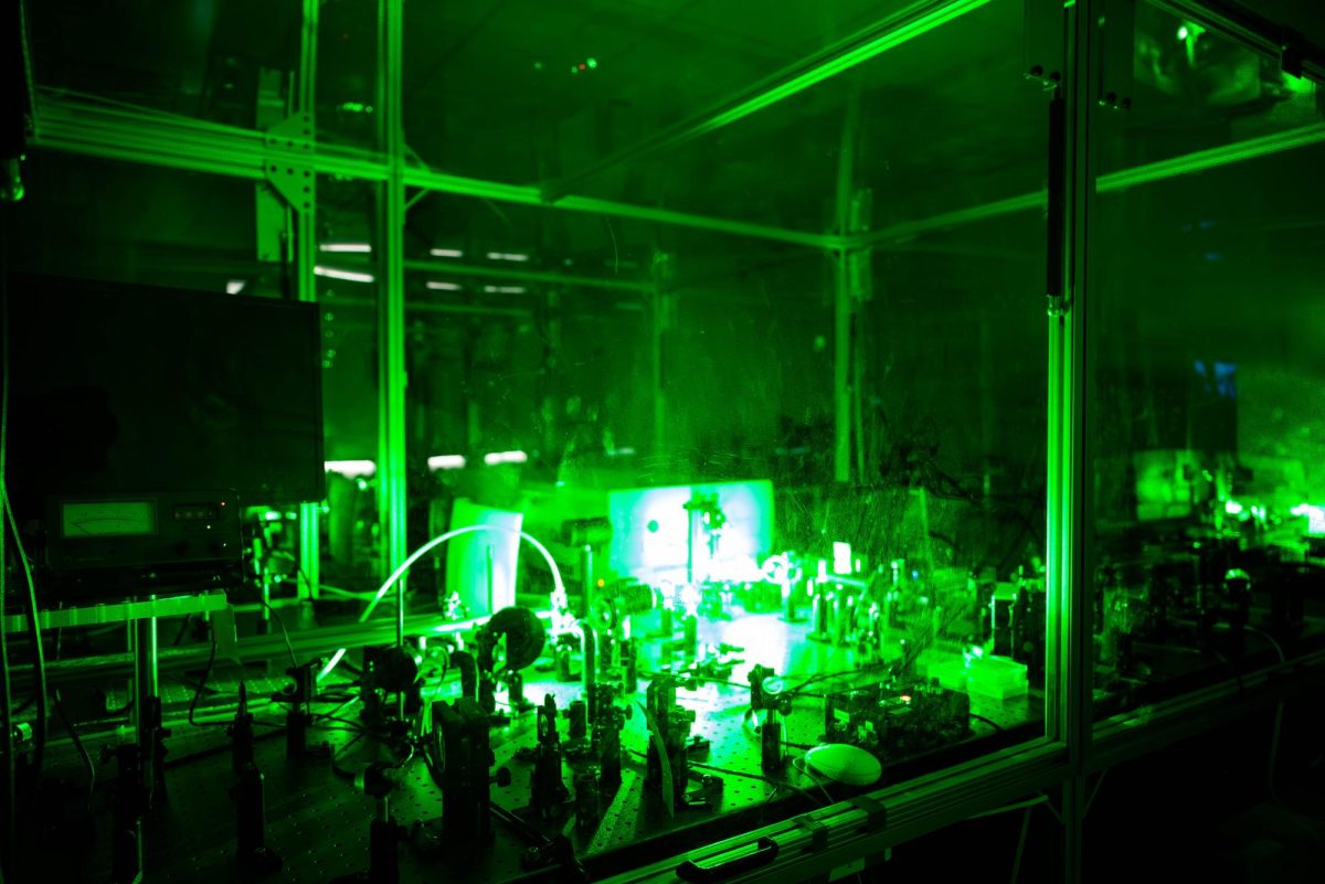 The laser bay of Colorado State University’s Laboratory for Advanced Lasers and Extreme Photonics Oct. 29. The bay is where the laser passes through several stages, with mirrors and crystals at each stage that shape and refine the laser as it goes, until it eventually comes out in the chamber where researchers can conduct experiments. Ghassan Zeraouli, a post-doctoral staff scientist at the lab, explained that the laser operates at about ten pulses per second. “We take those ten pulses, and we stretch them in time so that we can amplify them,” he said. “We start with smaller pulses, with less energy, and we use another laser to amplify those little pulses. The laser can be amplified in different stages.”