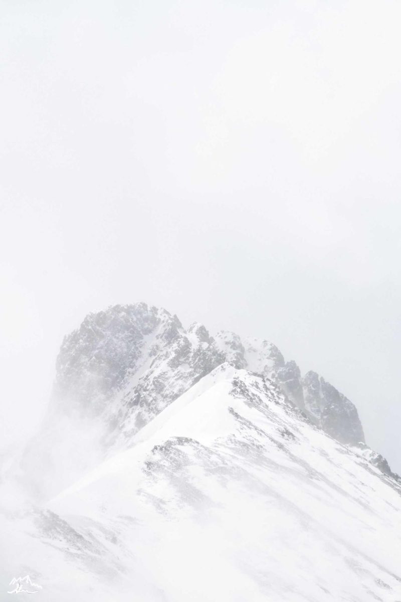 The Nokhu Crags sits visible in a snowstorm along the Poudre Canyon Road in Larimer County Jan. 25. 