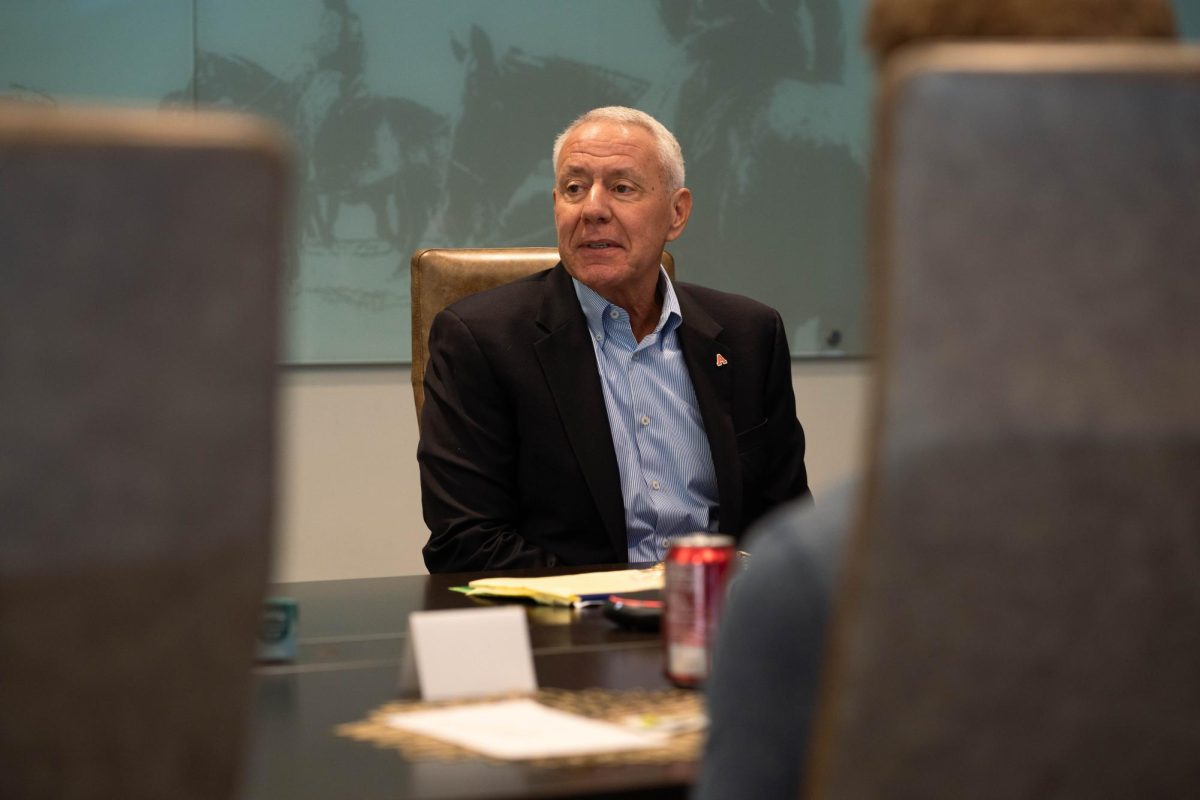 Former Colorado Rep. Ken Buck visits with Colorado State University students and faculty Jan. 30. Buck spoke with students about future job prospects, careers and plans in the Animal Sciences building.