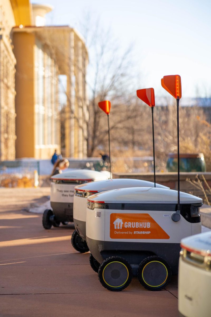 Starship robots sit waiting for food pickups outside the Lory Student Center Jan. 28. 