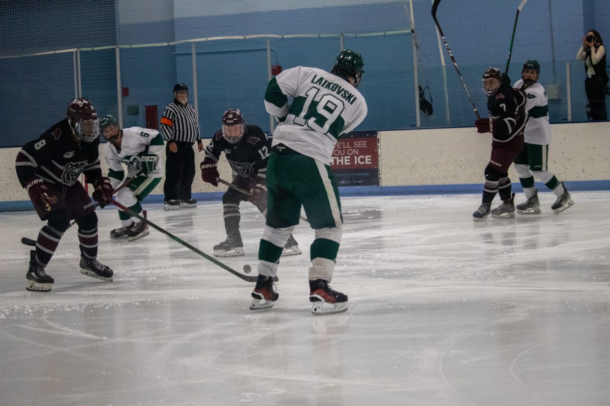 Alex Latkovski (19) shoots the puck during the match versus Missouri State Jan 31. The Rams lost to the Bears 5-4.