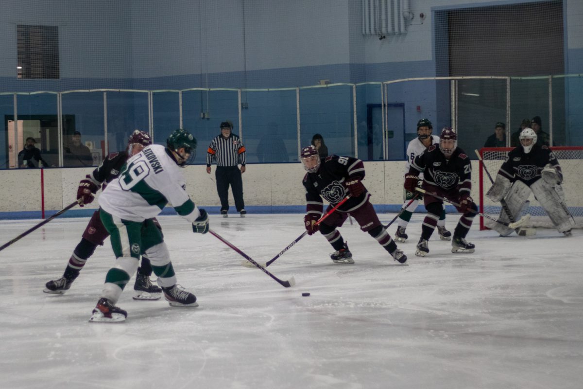 Alex Latkovski (19) shoots the puck during the match versus Missouri State Jan 31. The Rams lost to the Bears 5-4.