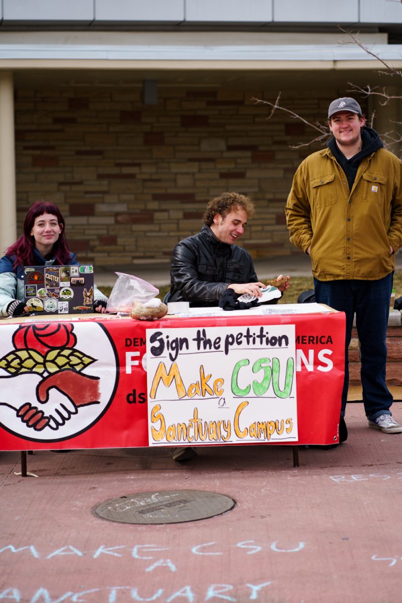 Young Democratic Socialists of America members and Colorado State University students Lindy Guttormson, Michael May and Tyler Cooper table in the Lory Student Center Plaza Feb. 4. May and other members of CSU YDSA put together a petition to make CSU a sanctuary campus, a petition which May said has over 2,000 signatures.