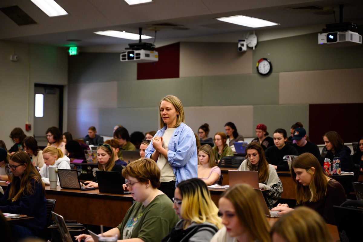 Professor Sara Garvey walks through Pathology 101 during her Psychology of Human Sexuality class as her students fill out an activity Feb. 7.