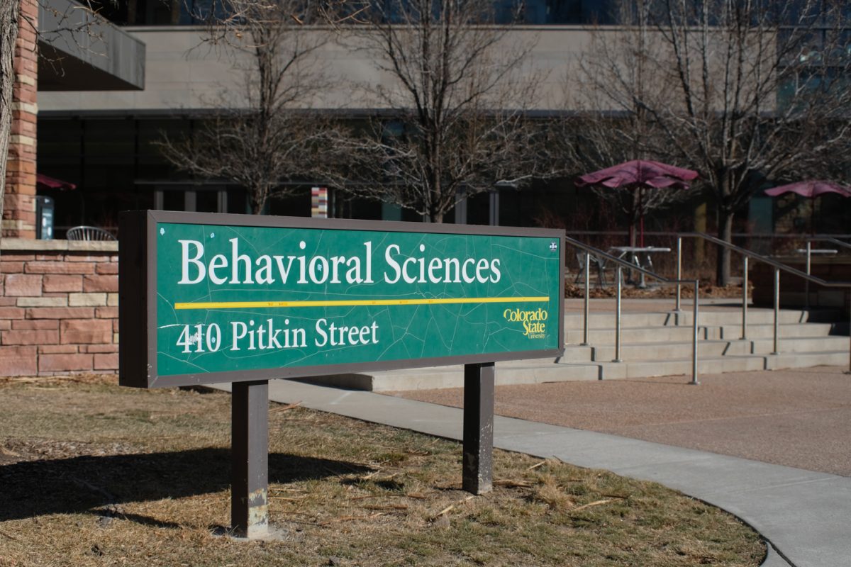 A green sign sits outside of and specifies the address of the Behavioral Science Building, on Colorado State University’s quiet main campus on Saturday, February 8.