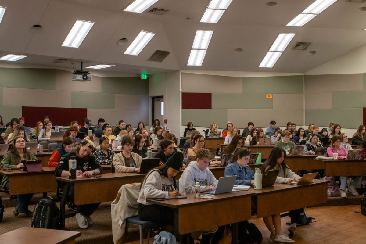 Sara Garvey's Psychology of Human Sexuality class takes notes during her lecture. Garvey has a PhD in Health and Social Psychology. Feb. 7.