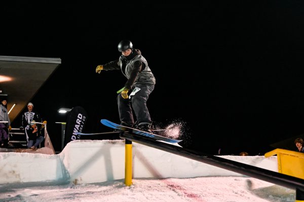 Competitor Evan Ellis, who has been skiing since the age of 5, rips on the middle rail during the open section of RailJam Feb. 13. The event was organized by the Associated Students of Colorado State University and the Snowriders Club.