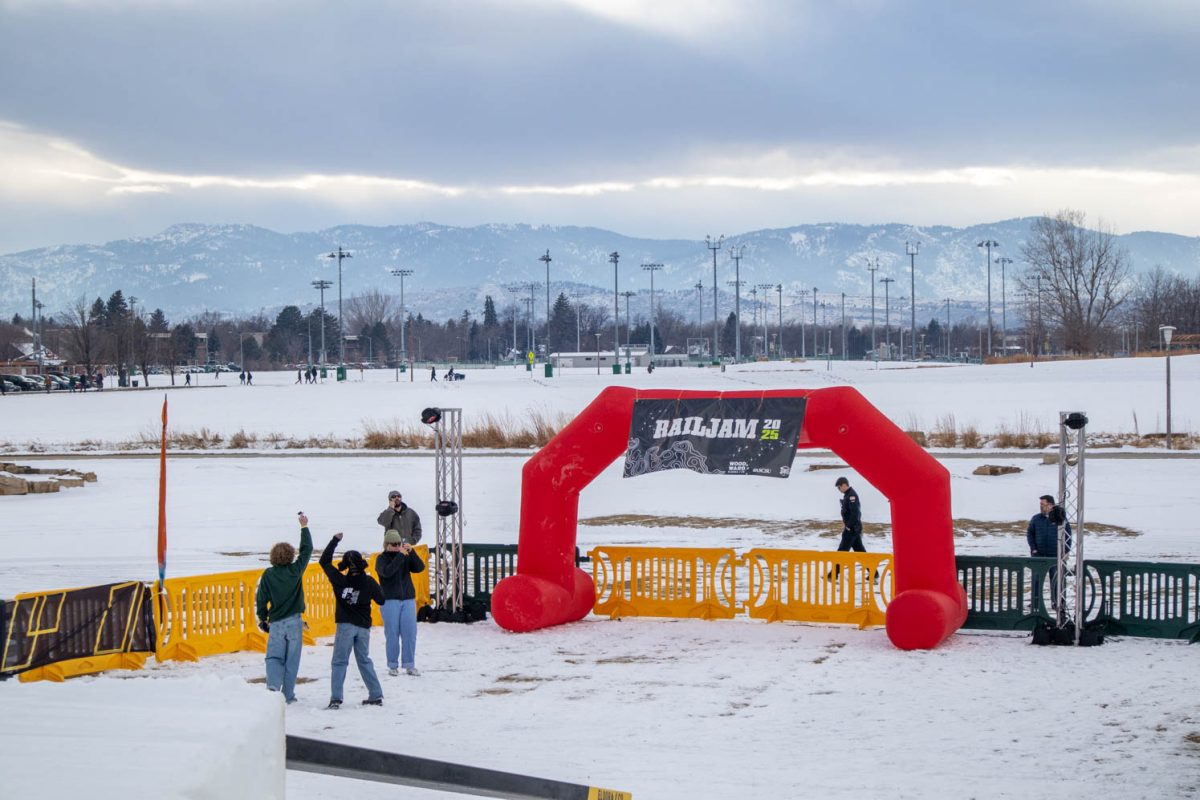 The 2025 RailJam banner waves against the snow-covered Rockies as the Colorado State University Snowriders Club prepares for the event Feb. 13.
