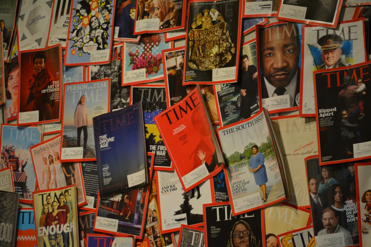 A collection of magazines on a wall