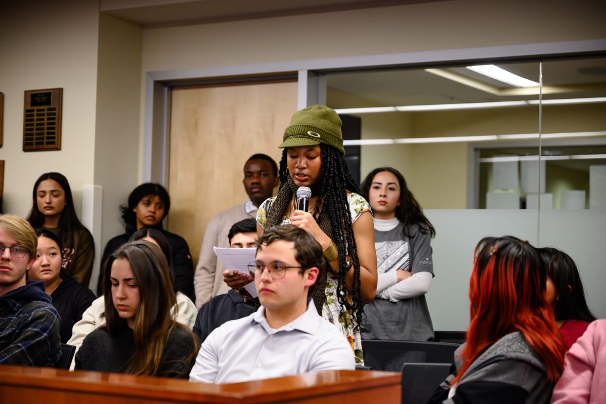 Jada Askew speaks about her experience as a freshman on Colorado State University's campus in the senate chamber of the Associated Students of Colorado State University Feb. 19. She is a member of the Black/African American Cultural Center. "BAACC has gifted me so much in just a few months being here at CSU," she said. "They gave me a home to do well, blessed me with laughs, snacks and events that bring community, knowing that I'm not alone in my experiences."