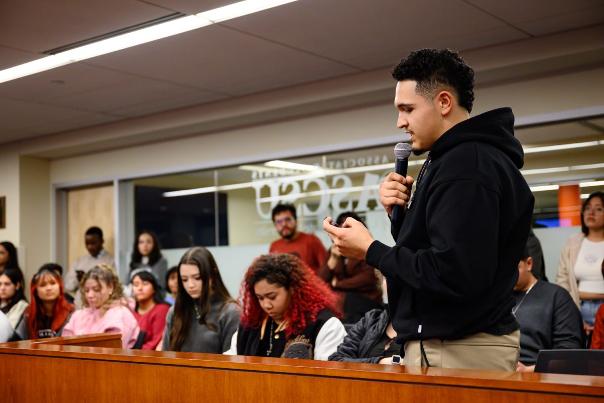 Martin Castañon gives statements to the students gathered in the senate chamber of the Associated Students of Colorado State University Feb. 19. "Cultural resource centers are more than physical spaces--they are lifelines that strengthen our community by nurturing each student's wellbeing and mental health," he said. "These centers create ripples of positivity and change every day."