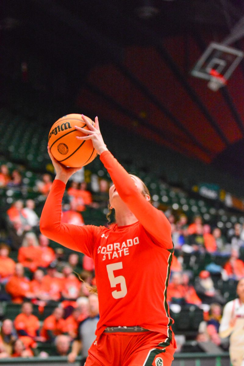 Jadyn Fife going for a layup against the Fresno State bulldogs Feb. 19. Jadyn and her teammates are wearing their Aggie jerseys as they defeat the bulldogs with a score of 68-48.