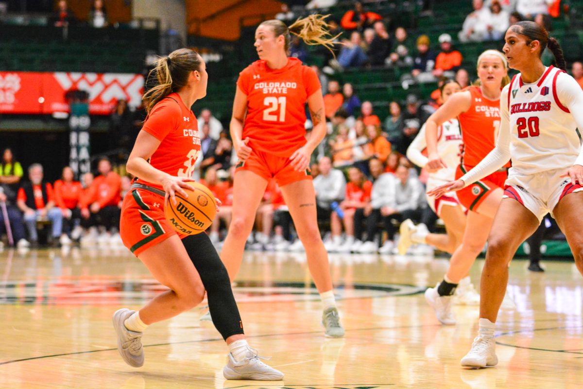 Hannah Simental looking to her teammates to pass the ball Feb. 19. The Colorado State Women’s Basketball team won against Fresno State Bulldogs with a score of 68-48.