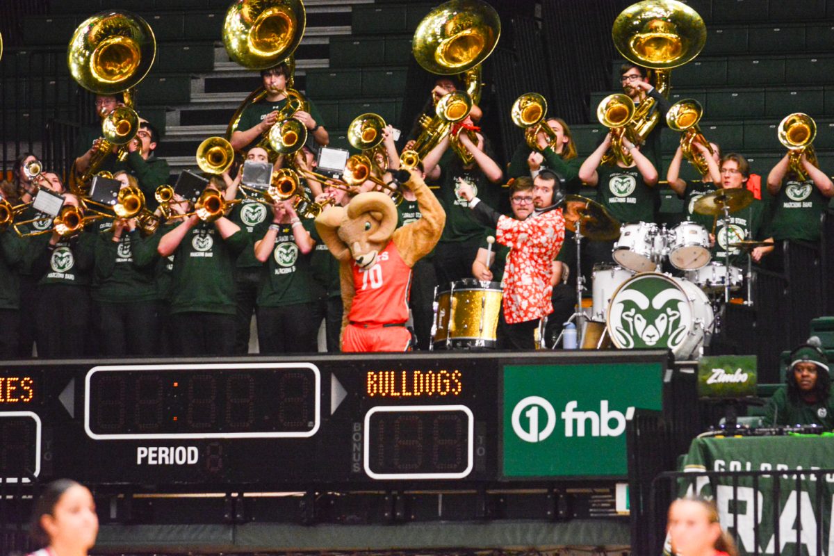 Ram the Cam dancing with the band during Colorado States Women’s basketball game Feb. 19. This game was against Fresno State and they were defeated with a score of 68-48.