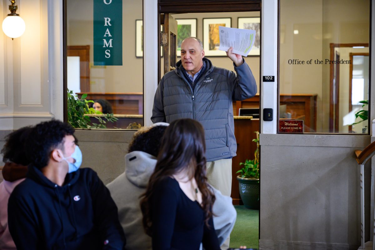 Assistant Vice President for Safety &amp; Risk Services and Chief Resilience Officer Marc Barker brings paperwork for students in the Colorado State University Administration Office during a sit-in Feb. 20. "I've got some documentation for you to read through about public space, non public space, those types of things, coming right out of our policy library," he said. "This is deemed disruptive, and you can read through why. This is not a public space for free speech, while it is a space open to the public there is a difference."