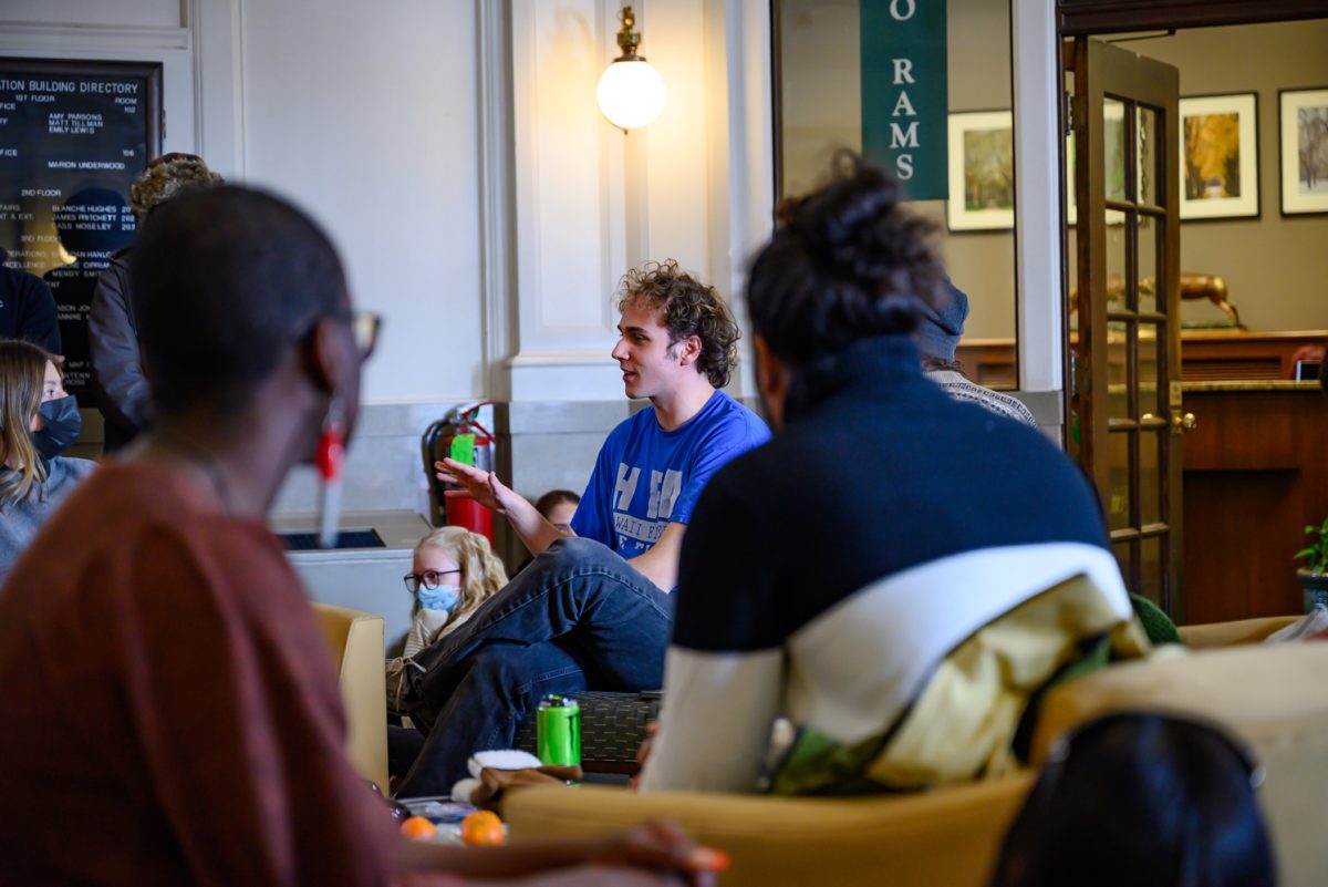 Young Democratic Socialists of America Co-Chair Michael May speaks to a group of students gathered in the Colorado State University Administration Office to peacefully sit-in Feb. 20.