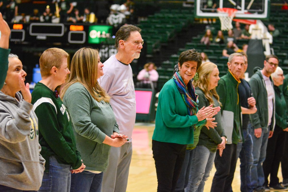 Cancer survivors' lining up to be recognized at CSU's Women's basketball game Feb. 1. The CSU women's basketball players had their last names on their jerseys as they played.