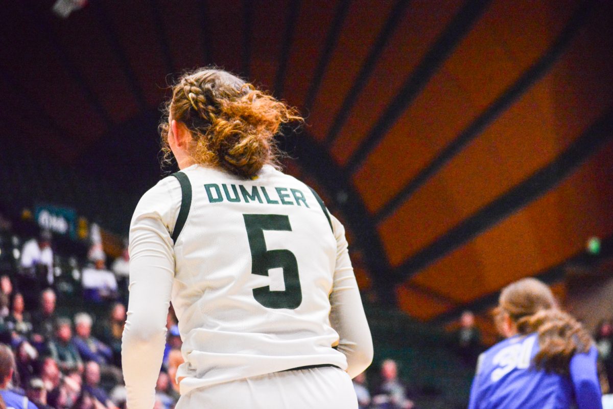 Jadyn Fife (#5) looking for the ball on the court during their game against Air Force Fe.1. CSU’s women’s basketball team went up against Air Force while having the last names of cancer survivors on their jerseys.