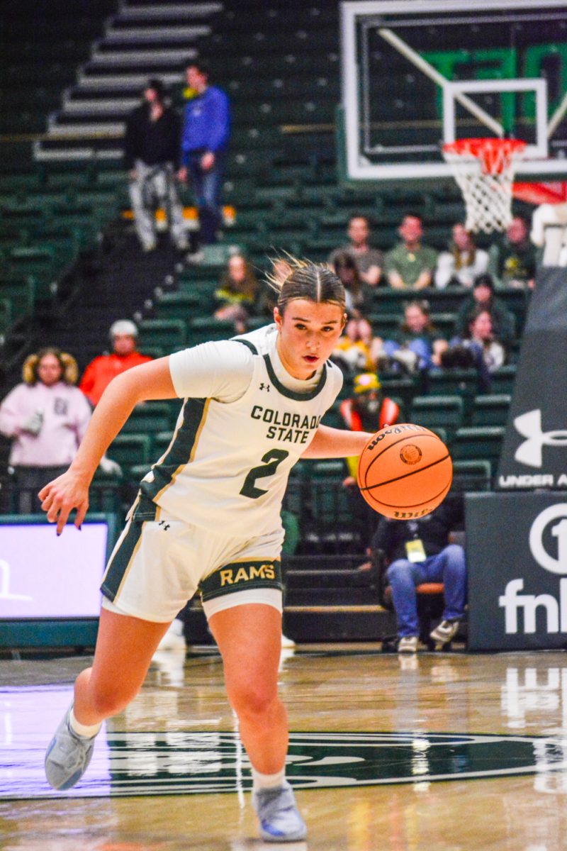 Guard Brooke Carlson gets ready to pass the ball to her teammates during Colorado State University's game against the United States Air Force Academy Feb. 1. CSU lost 75-71.