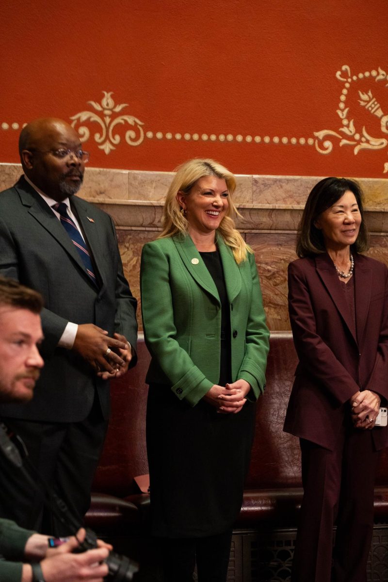 CSU Pueblo Interim President Rico Munn, Colorado State University President Amy Parsons and CSU Global President Becky Takeda-Tinker react to legislators celebrating Colorado State University Feb. 11. Part of Founder's Day celebrations, top leadership from CSU attended the legislative session at the Colorado Capitol. 