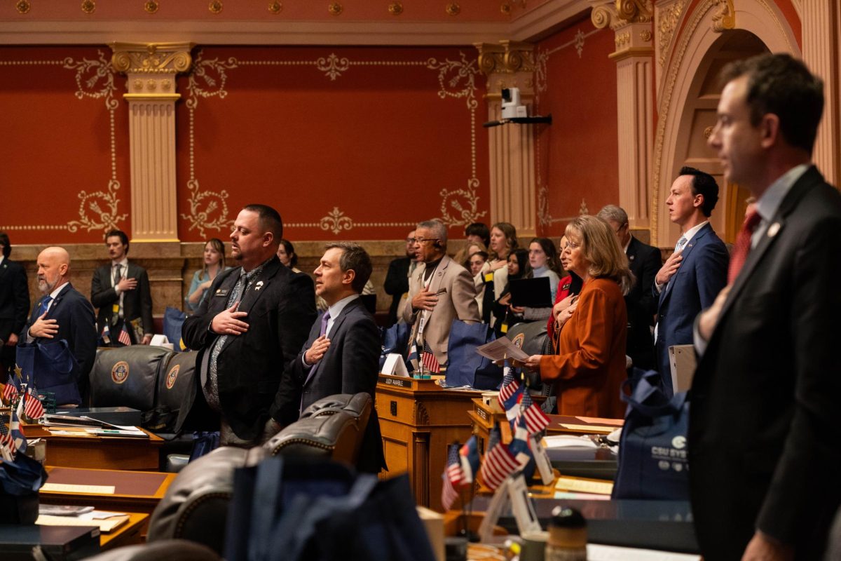 Members of the Colorado senate say the pledge of allegiance before the beginning of the legislative session Feb. 11. The senate along with CSU system leadership celebrated the day as CSU Founder's Day.