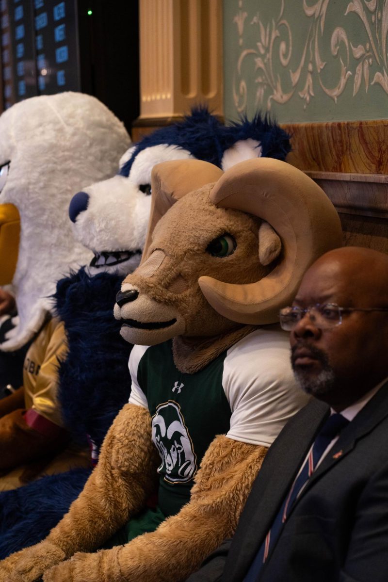 Goldie the Golden Eagle, Colorado State University Global's mascot, Wolfie the ThunderWolf, CSU Pueblo's mascot and CAM the Ram, CSU Fort Collins' mascot, sit on the Colorado House of Representatives floor Feb. 11. The mascots attended the Founder's Day celebration at the Colorado Capitol. 