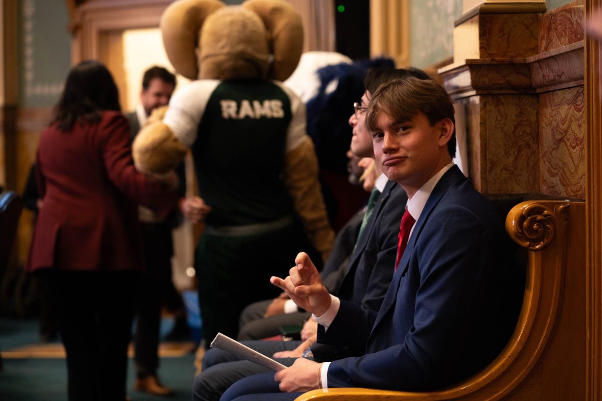 Associated Students of Colorado State University intern Isaac DenBraber supports CSU at the Founder's Day celebration at the Colorado Capitol. Members of ASCSU attended the legislative session Feb. 11. 