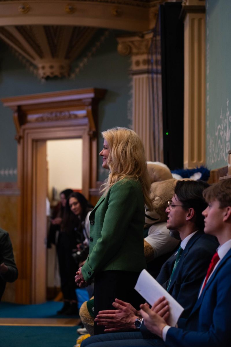 Colorado State University President Amy Parsons stands to be recognized as part of CSU Founder's Day celebrations at the Colorado Capitol Feb. 11. Parsons and other CSU System Leadership attended the legislative session.