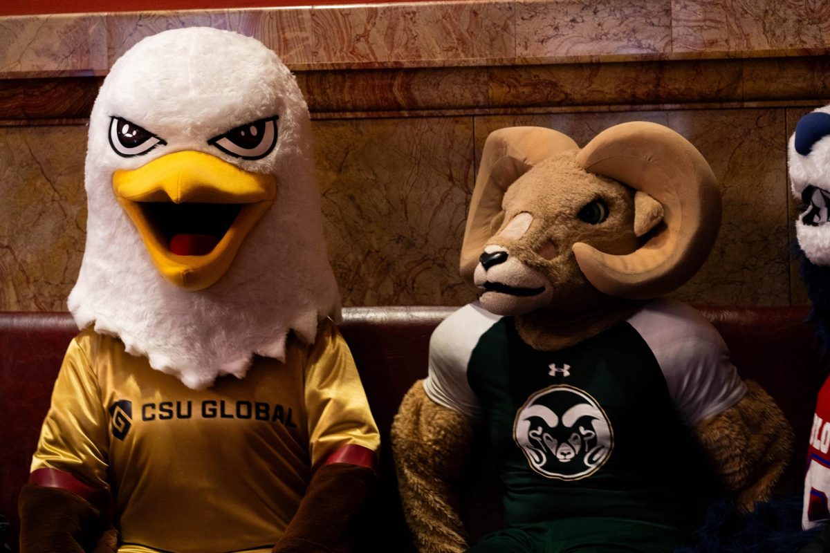 Goldie the Golden Eagle, CSU Global's mascot and CAM the Ram, CSU Fort Collins' mascot, sit on the Colorado Senate floor Feb. 11. The mascots attended the Founder's Day celebration at the Colorado Capitol. 