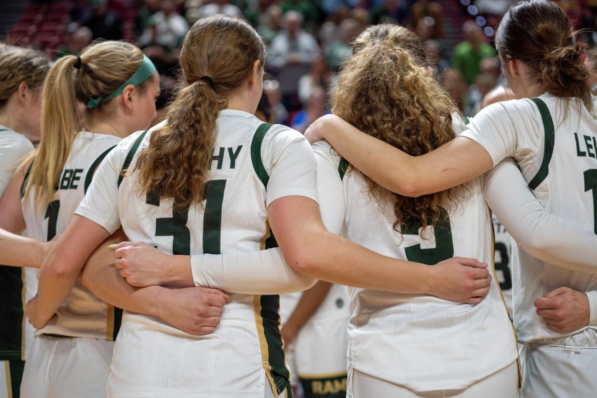 Colorado State women's basketball stands together in preparation for what would be its final game of the season against Fresno State March 10. CSU lost 54-52.