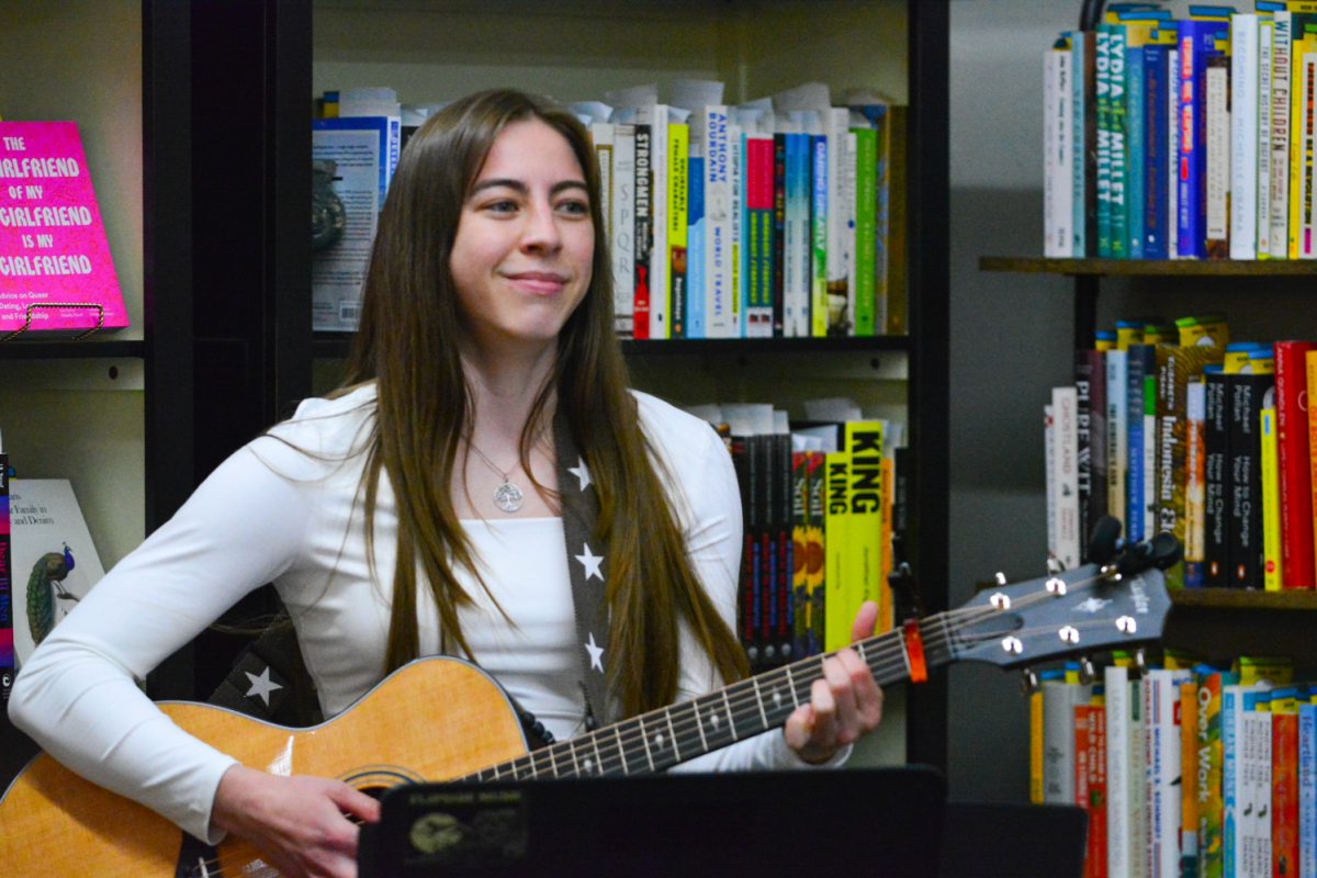 Bailey Mae sang during an art walk in old town Fort Collins March 8. She sang multiple songs duirng the art showcase.