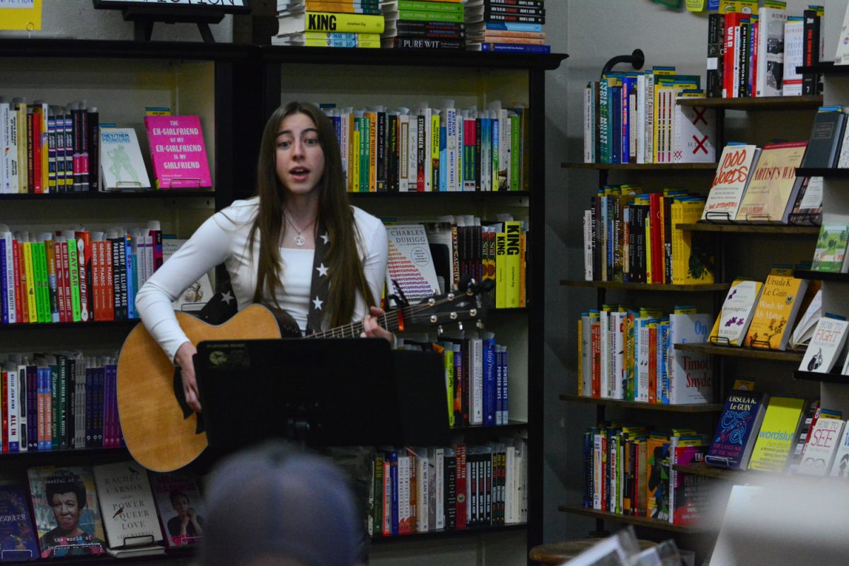 In old town Fort Collins there was an art walk in a bookstore March 8. Bailey Mae sung to the small crowd that attended the art walk.
