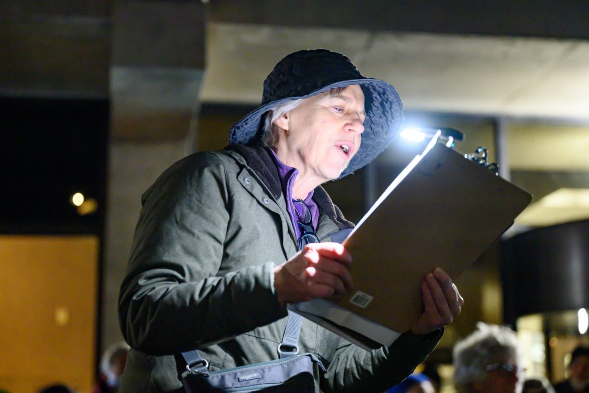 Kathy Maher, Vice President of the League of Women Voters of Larimer County, speaks to a crowd gathered outside the Fort Collins Post Office March 4. Organized by the League, the protest took place during the President's address to Congress and was meant to build community by coming together and speaking about stories that people could relate to. "I constantly thought tonight about all of the abuses that we dindn't talk about," she said. "We chose a few that were most salient in the news of late, and I think that resonate the most with most the people in the country right now and particularly in this community."