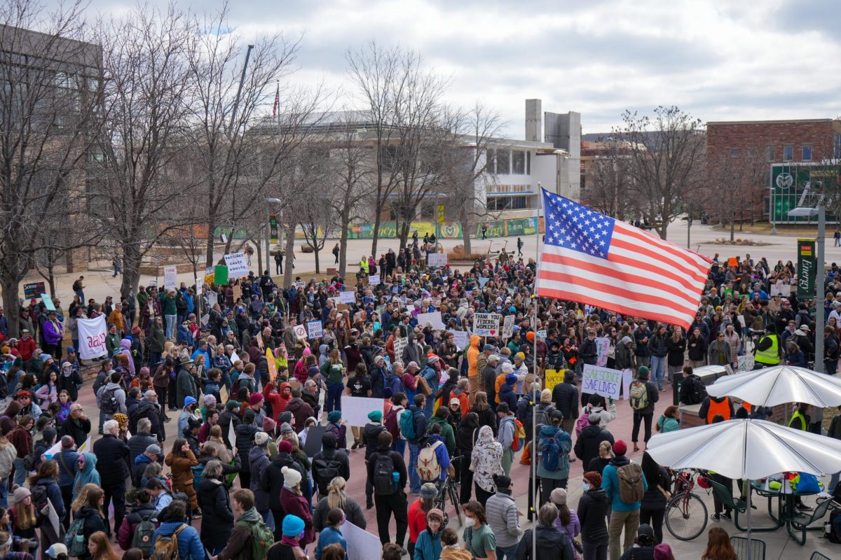 Colorado State University students and faculty and Fort Collins community members gather on the Lory Student Center Plaza for the nationwide Stand Up for Science protest March 7.
