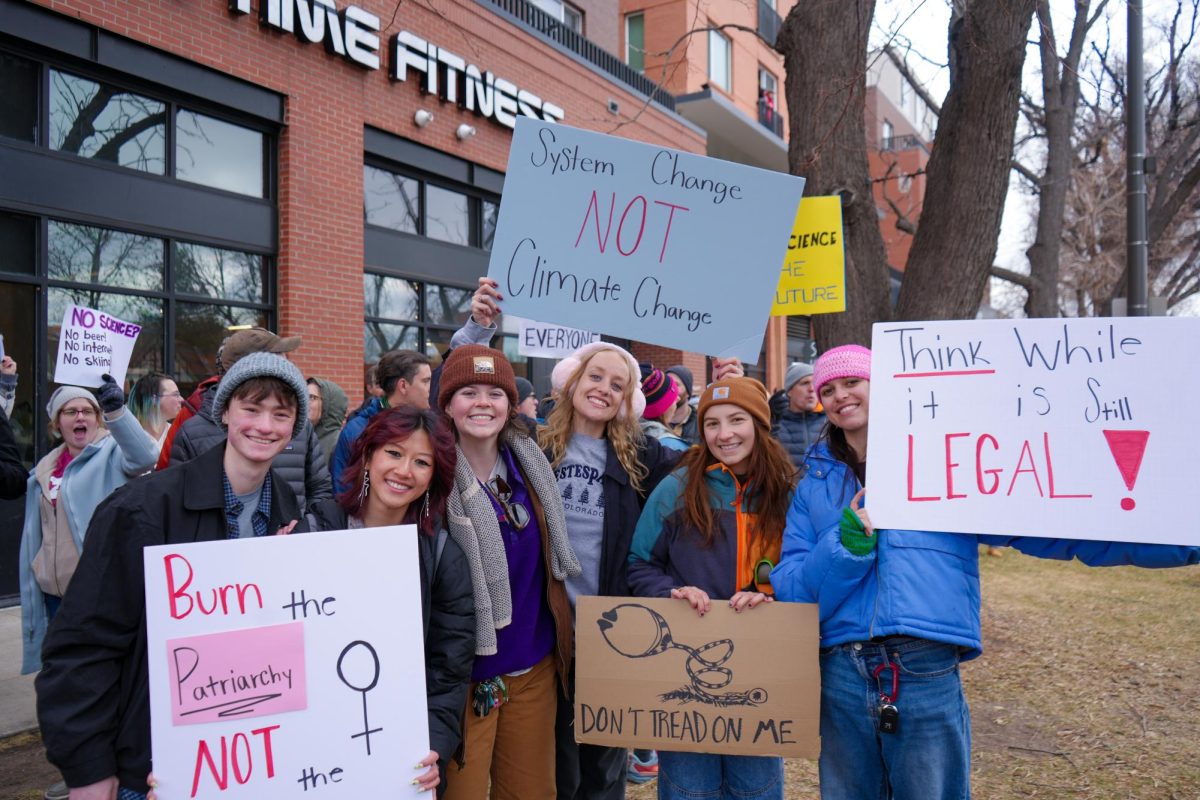 CSU students proudly hold up their signs in support of the nationwide protest "Stand up for Science" on March 7 2025. 
