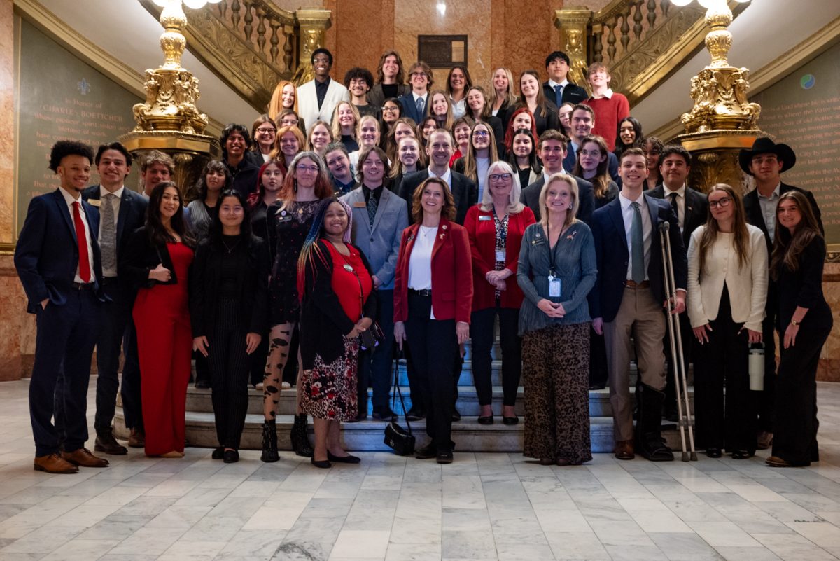 Members of the Associated Students of Colorado State University and Colorado state legislators gather on an interior stairwell of the Colorado State Capitol in Denver for a photo March 10. ASCSU's Day at the Capitol serves as an opportunity for students to meet with their representatives and see the process that goes into passing legislation. 