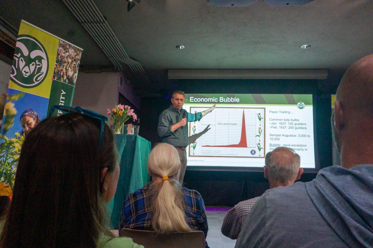 Chad Miller, Associate Professor at Colorado State University, explains "tulip mania" during his talk, "Tiptoeing Through the Tulips: Exploring a Colorful History" at the Fort Collins Welcome Center March 12. In 1636, tulip prices rose quickly and then crashed the next year, also known as "Tulip Mania," Miller explained.