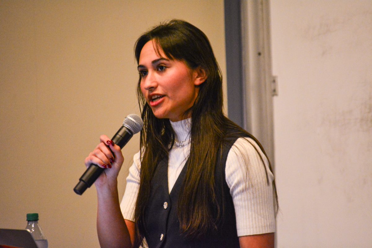 Chloe Cole speaking during her anti-trans speech at Colorado State University March 27. "People will literally stand outside for hours, even in violent thunderstorms." Chloe Cole said "using their colorful flags as umbrella and blankets just to scream at a 5'4 woman for saying to stop medically abusing children."