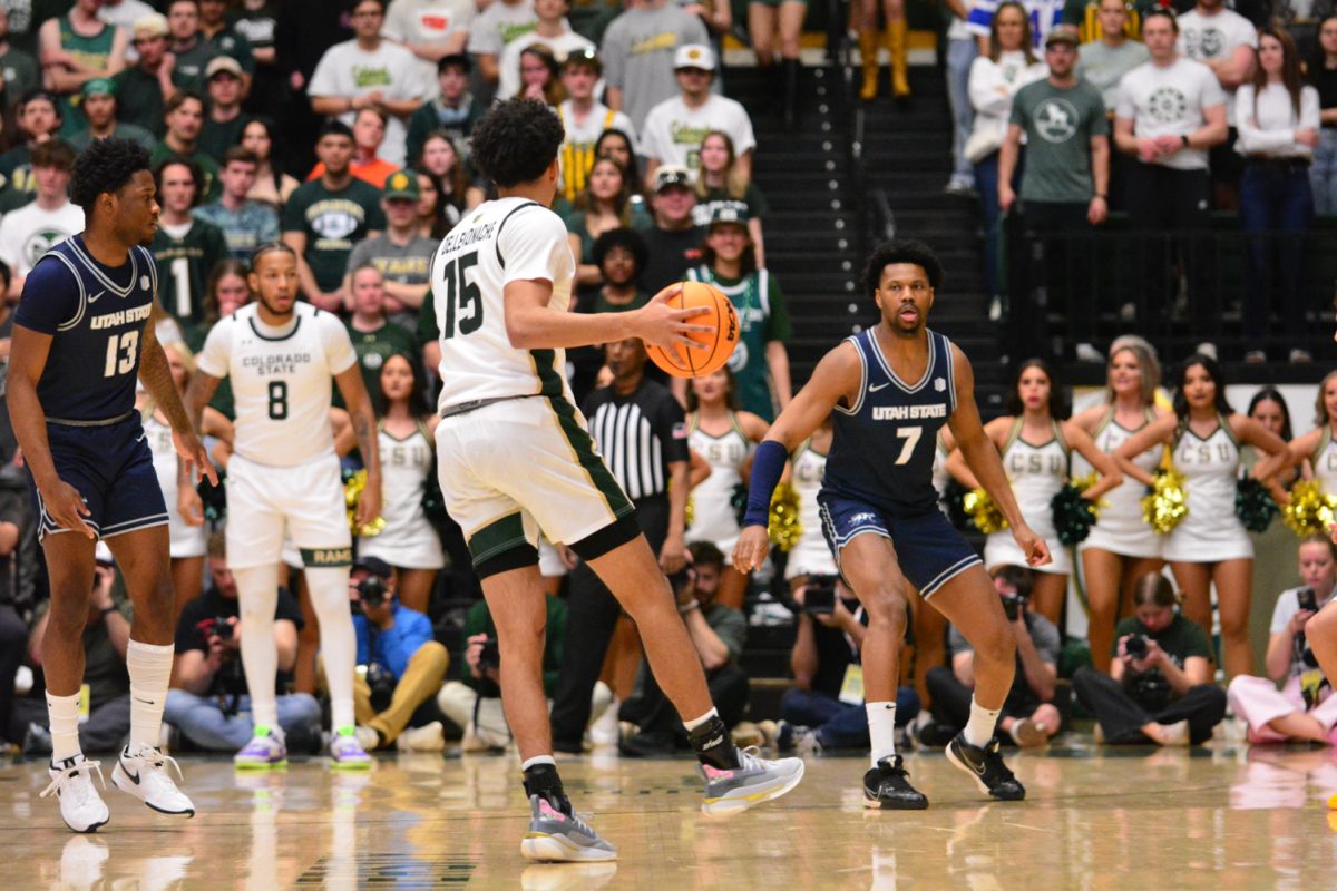 Jalen Lake dribbling the ball during a play against Utah State March 1. Jalen and his team defeated Utah State with a score of 93-66.