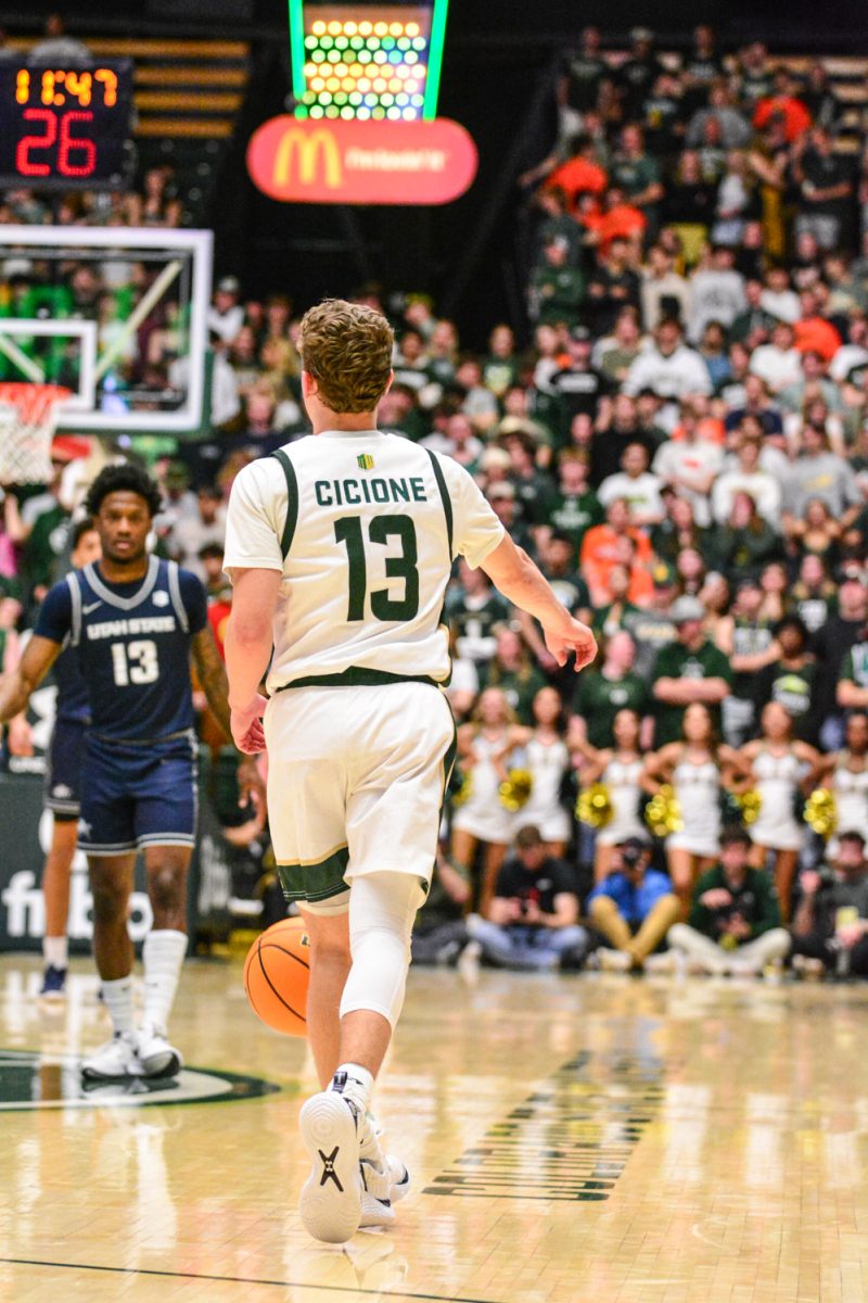 Bowen Born dribbling the ball down the court March. 1. Bowen and his teammates defeated Utah State with a score of 93-66.