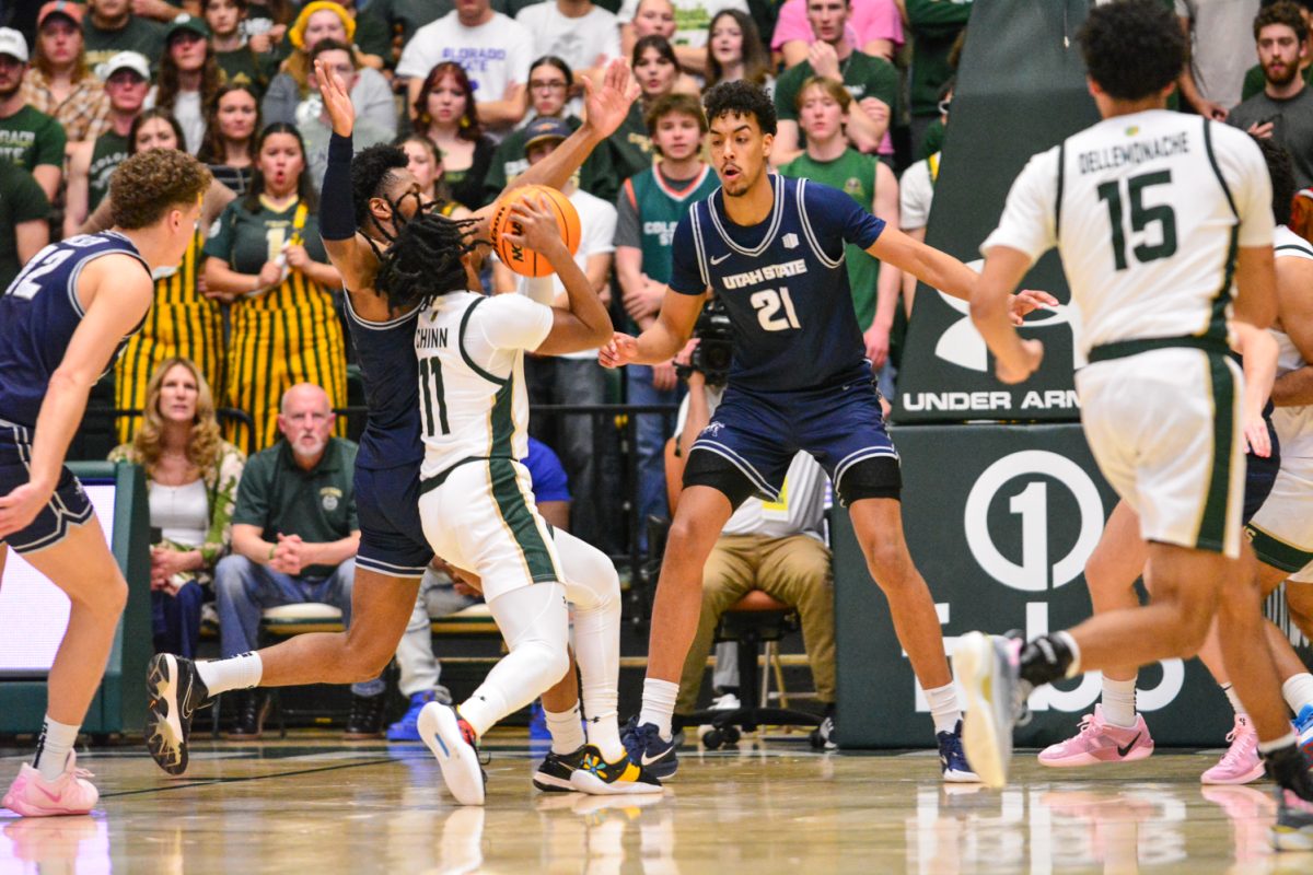 Keshawn Williams trying to make a layup and getting blocked March. 1. Colorado State University defeated Utah State with a score of 93-66.