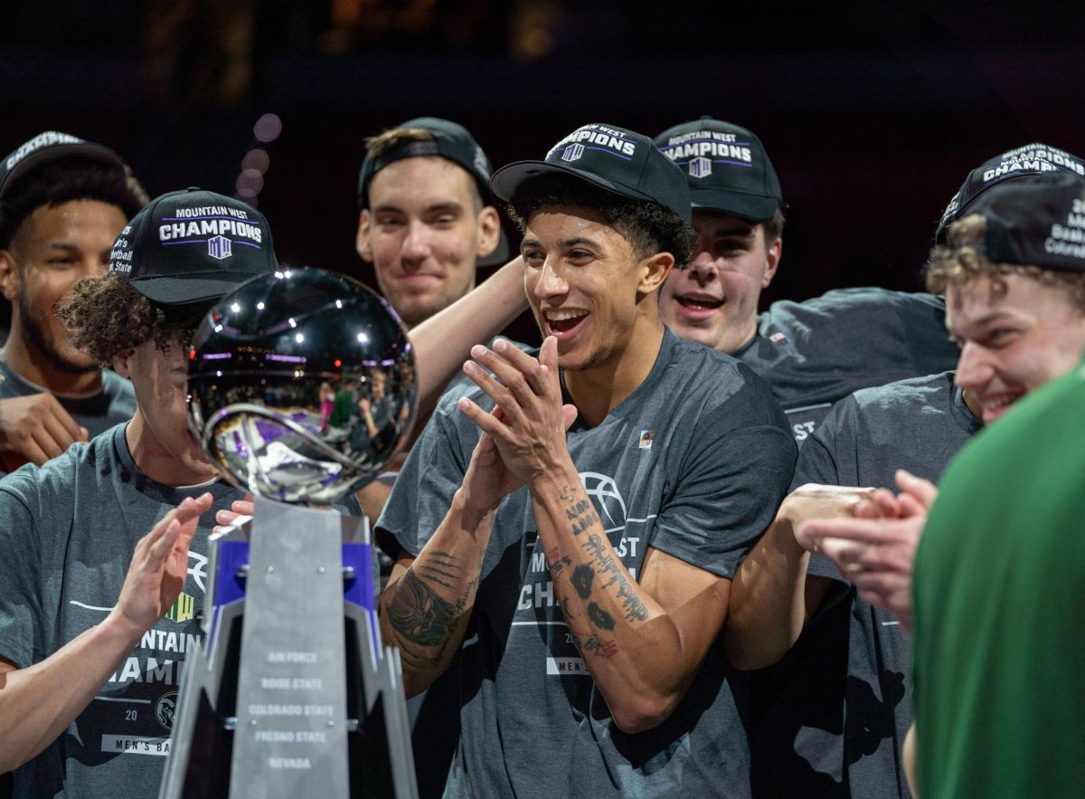 Nique Clifford and CSU men's basketball celebrate after claiming the first MW championship in 22 years. Colorado State University defeated Boise State in the title game 69-56 March 15.