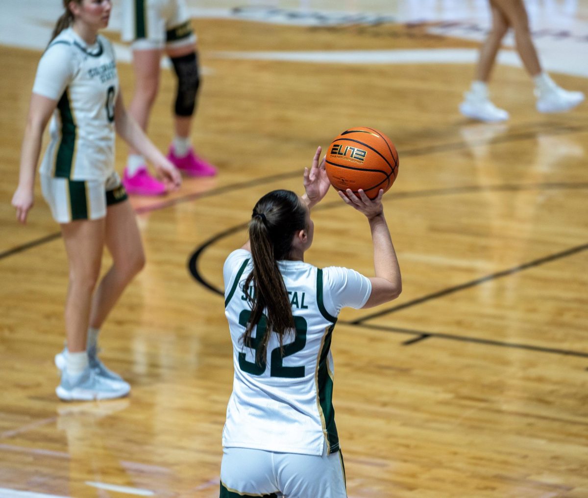 Hannah Simental (32) warms up before the Quarterfinals against Fresno State on March 10. 
