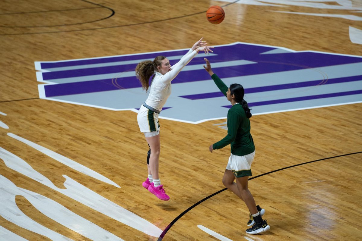 Jadyn Fife (5) warms up before the Quarterfinals against Fresno State on March 10. 